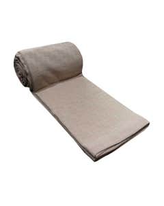 Cubrecama beige de algodón con diseños